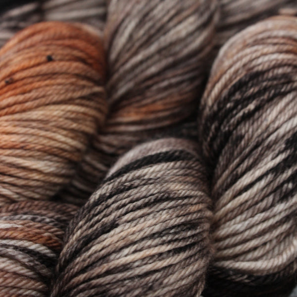 Hand dyed 100% Merino yarn, browns and black
