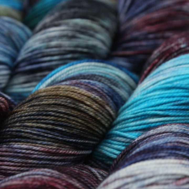 Handdyed yarn merino 4ply fingering blues purple brown