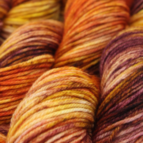 Handdued Yarn merino 8ply DK brown yellow orange purple