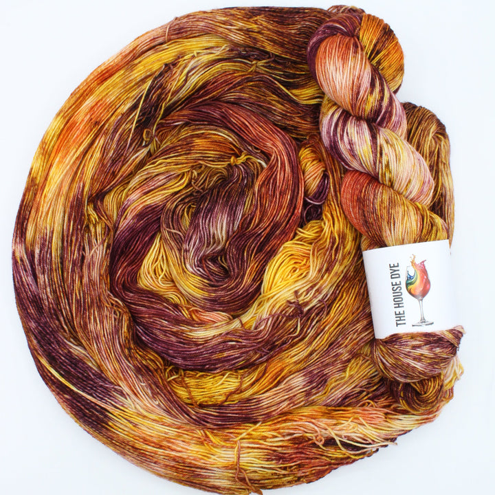 Handdyed merino 4ply yarn yallow brown purple
