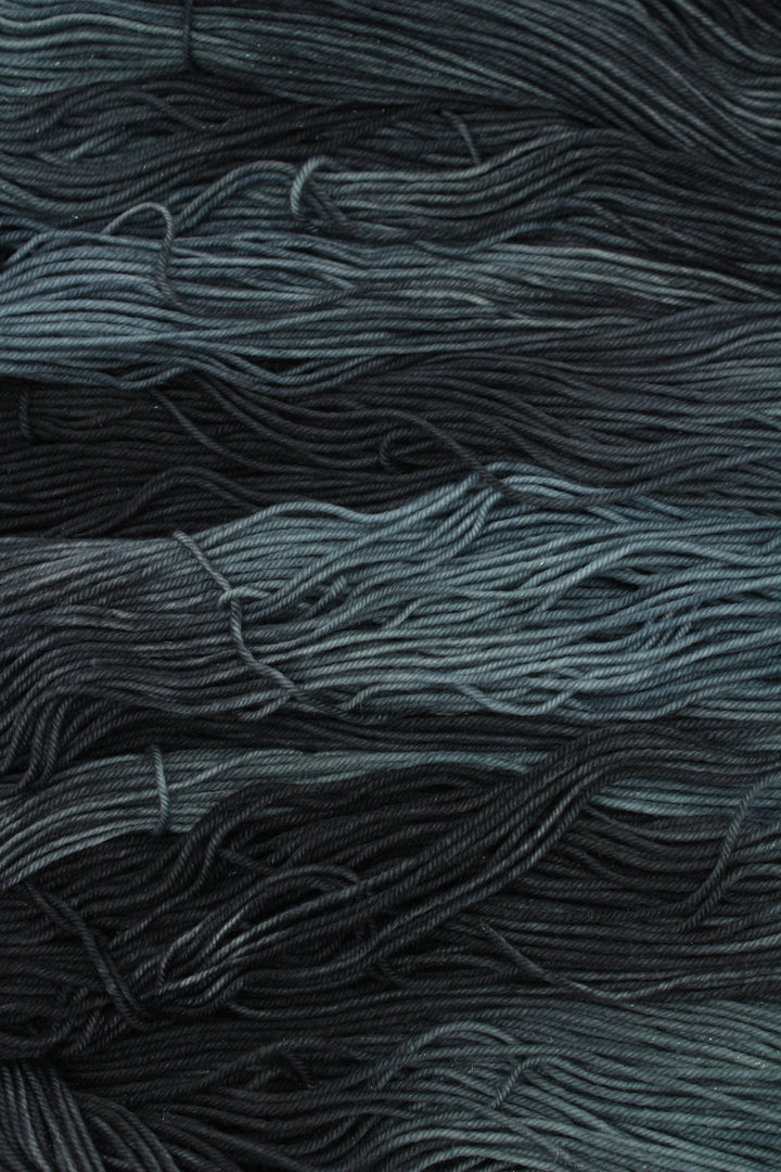 Swamp Monster Semi solid green/black merino 4ply yarn