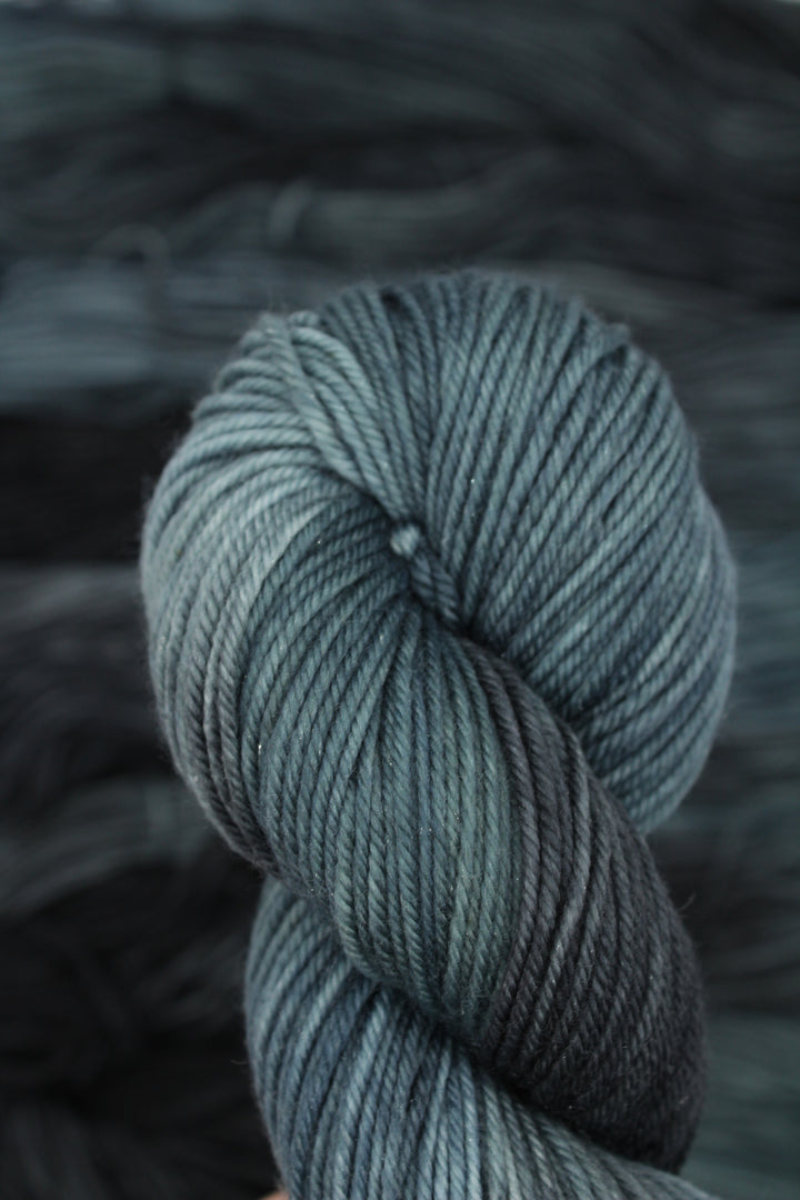 Swamp Monster Semi solid green/black merino 4ply yarn